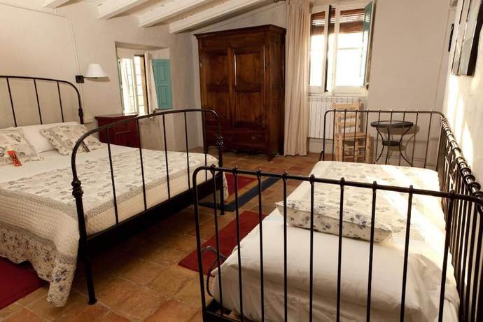 Imagen de la habitación del Hotel Rural Mas Masaller. Foto 4