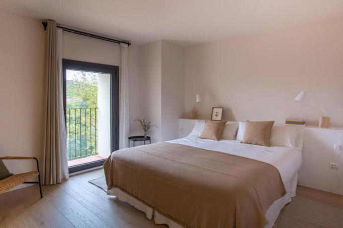 Imagen de la habitación del Hotel Rural Mas de l'Illa. Foto 4