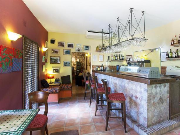 Imagen del bar/restaurante del Hotel Rural Molino Del Puente Ronda. Foto 2