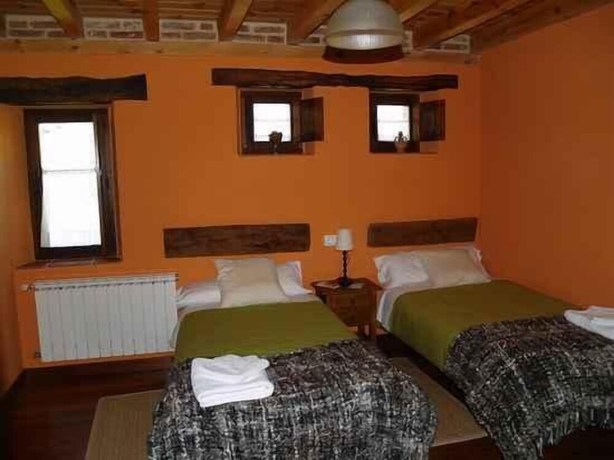 Imagen de la habitación del Hotel Rural Piedra Abierta. Foto 11