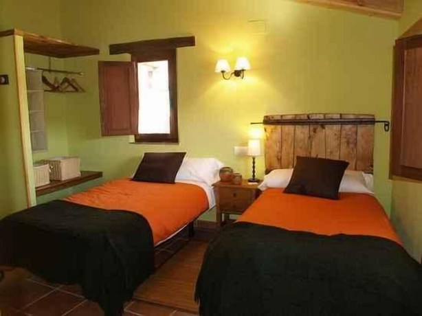 Imagen de la habitación del Hotel Rural Piedra Abierta. Foto 13