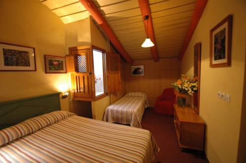 Imagen de la habitación del Hotel Rural Posada de Alajar. Foto 6