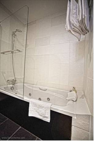 Imagen de la habitación del Hotel Rural Posada la Casona de Valbuena. Foto 4