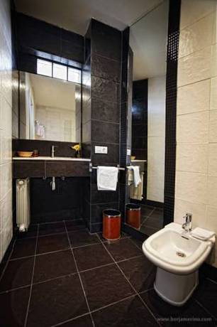 Imagen de la habitación del Hotel Rural Posada la Casona de Valbuena. Foto 8