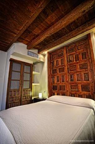 Imagen de la habitación del Hotel Rural Posada la Casona de Valbuena. Foto 9