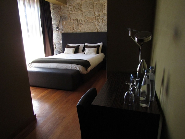 Imagen de la habitación del Hotel Rural Quinta Do Medronheiro. Foto 11