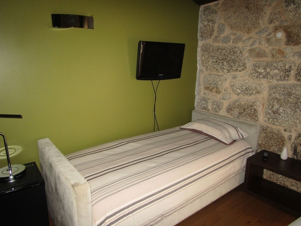 Imagen de la habitación del Hotel Rural Quinta Do Medronheiro. Foto 14
