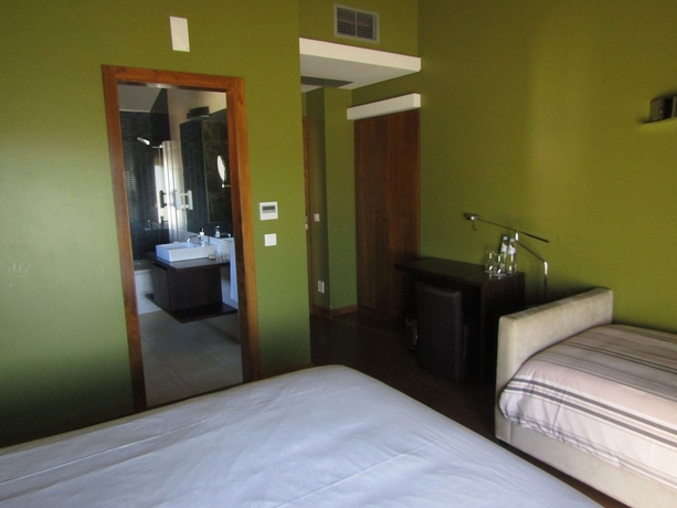 Imagen de la habitación del Hotel Rural Quinta Do Medronheiro. Foto 15