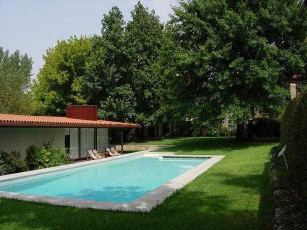 Imagen de la piscina del Hotel Rural Quinta da Ponte do Louro. Foto 18