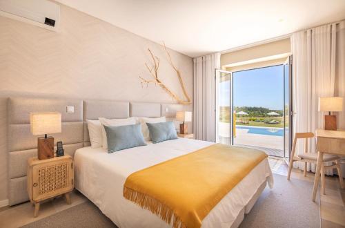 Imagen de la habitación del Hotel Rural Quinta do Carrascal. Foto 19