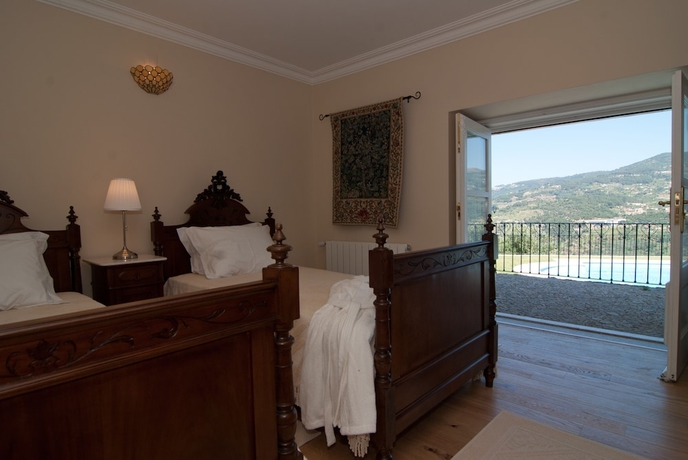 Imagen de la habitación del Hotel Rural Quinta do Outeiro. Foto 9