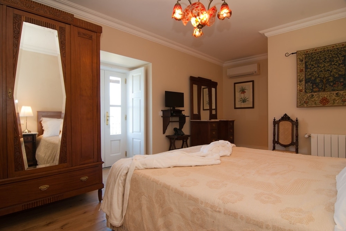 Imagen de la habitación del Hotel Rural Quinta do Outeiro. Foto 15