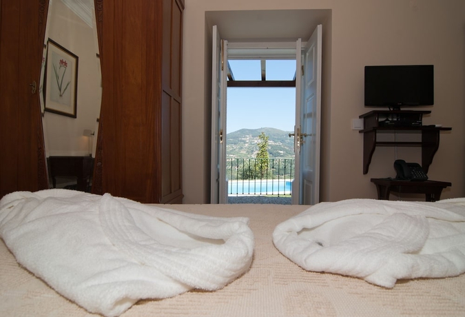 Imagen de la habitación del Hotel Rural Quinta do Outeiro. Foto 17