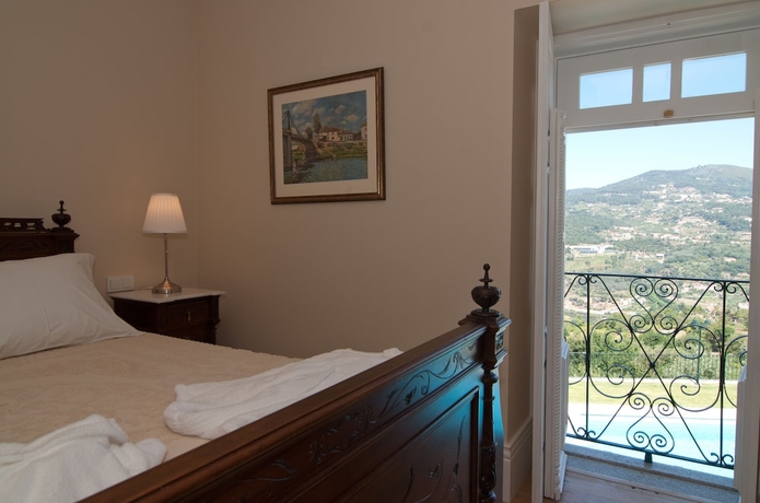 Imagen de la habitación del Hotel Rural Quinta do Outeiro. Foto 18