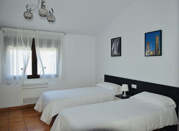 Imagen de la habitación del Hotel Rural Reillo Alojamientos Rurales. Foto 19