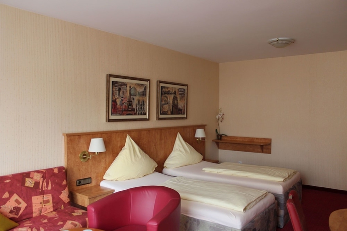 Imagen de la habitación del Hotel Rural Stadthotel Augsburg. Foto 3