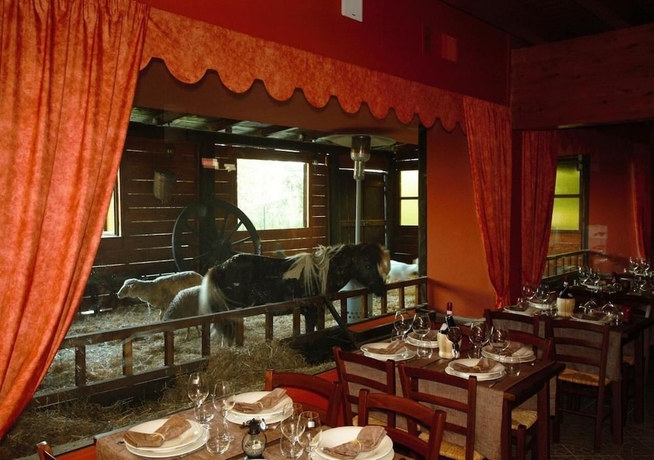 Imagen del bar/restaurante del Hotel Rural Tenuta Del Vecchio Mulino. Foto 6