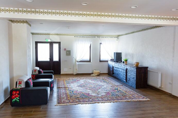 Imagen de la habitación del Hotel Rural Vatra Boiereasca. Foto 14