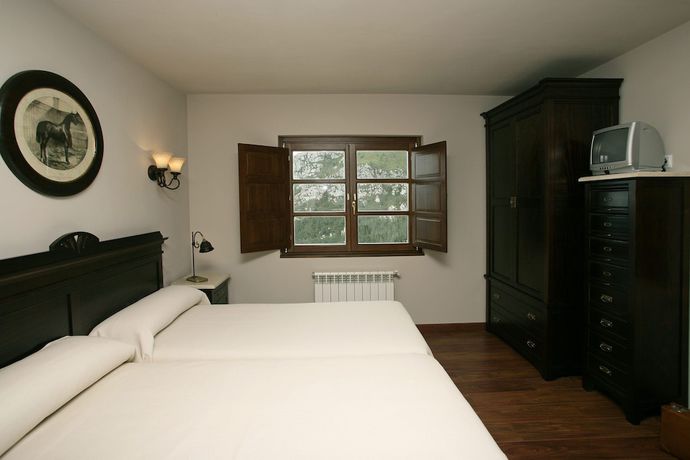 Imagen de la habitación del Hotel Rural Yeguada Albeitar. Foto 15