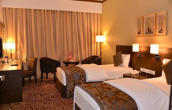 Imagen de la habitación del Hotel Rush Inn. Foto 7