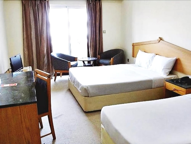 Imagen de la habitación del Hotel Rush Inn. Foto 8