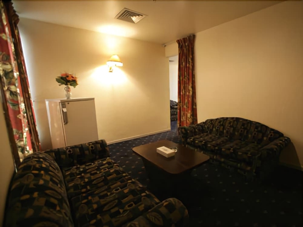 Imagen de la habitación del Hotel Rush Inn. Foto 10