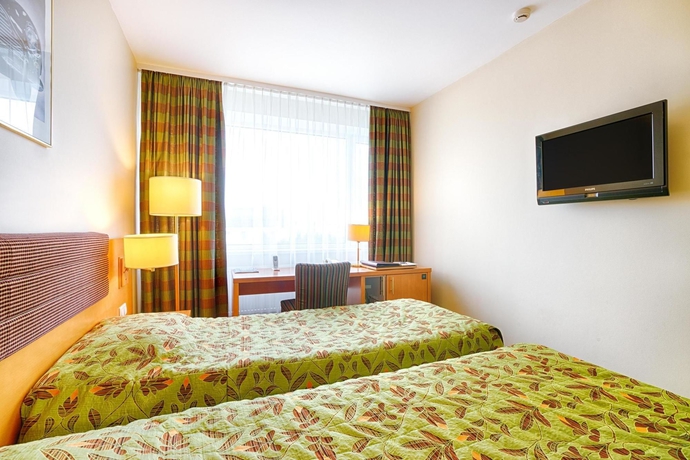 Imagen de la habitación del Hotel Rushotel. Foto 4