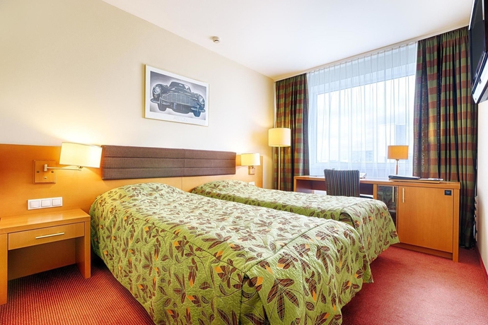 Imagen de la habitación del Hotel Rushotel. Foto 7