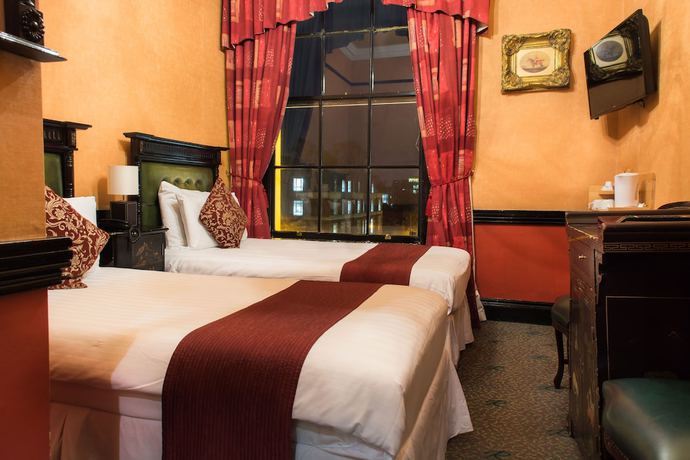 Imagen de la habitación del Hotel Russell Court. Foto 17