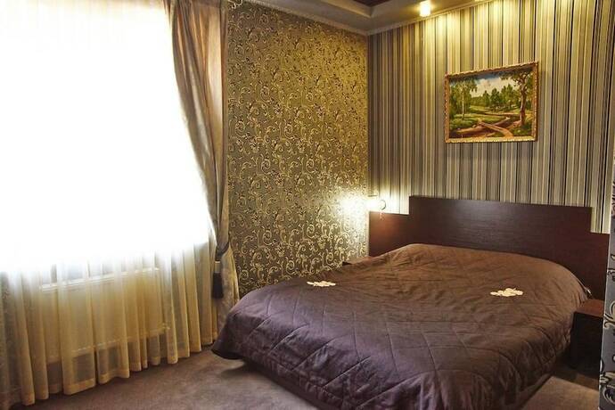 Imagen de la habitación del Hotel Russkaya Usadba, Magnitogorsk. Foto 19