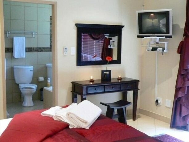 Imagen de la habitación del Hotel Rustenburg Boutique. Foto 26