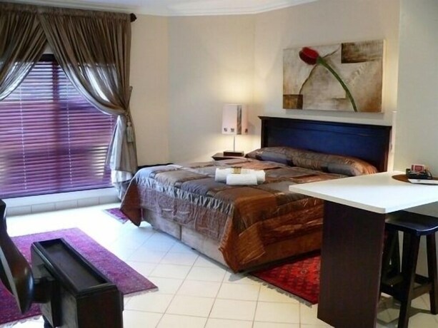 Imagen de la habitación del Hotel Rustenburg Boutique. Foto 27