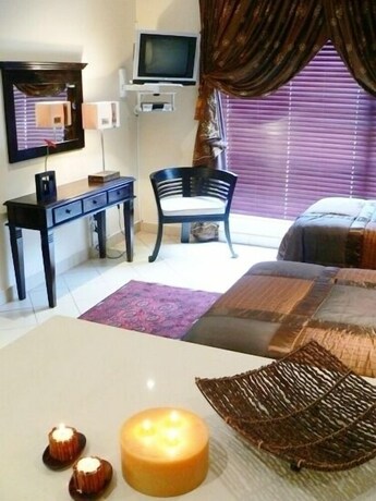 Imagen de la habitación del Hotel Rustenburg Boutique. Foto 35