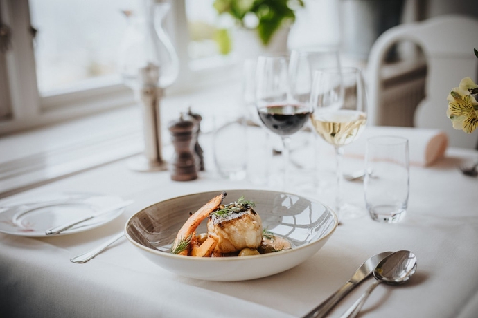 Imagen del bar/restaurante del Hotel Rusth&aring;llarg&aring;rden. Foto 4