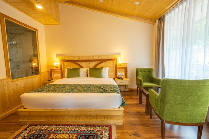 Imagen de la habitación del Hotel Rustic Wood Manali. Foto 18