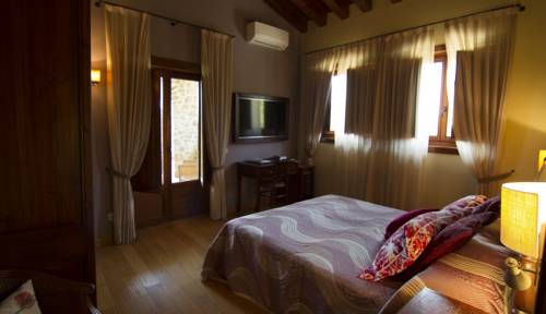 Imagen de la habitación del Hotel Rusticae El Ventós. Foto 9