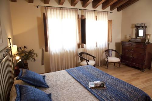Imagen de la habitación del Hotel Rusticae El Ventós. Foto 10