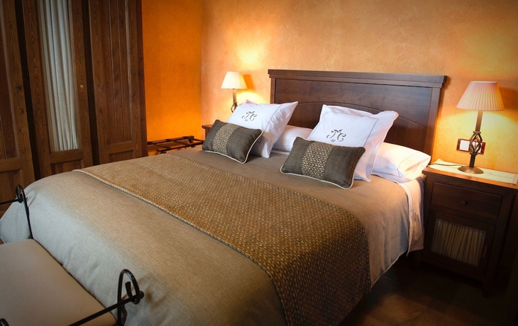 Imagen de la habitación del Hotel Rusticae La Casassa De Ribes. Foto 2