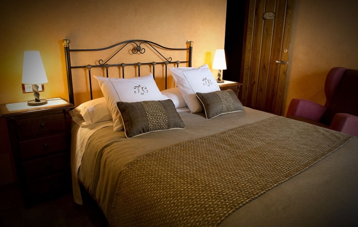 Imagen de la habitación del Hotel Rusticae La Casassa De Ribes. Foto 3