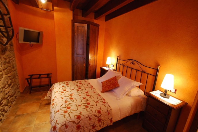 Imagen de la habitación del Hotel Rusticae La Casassa De Ribes. Foto 4