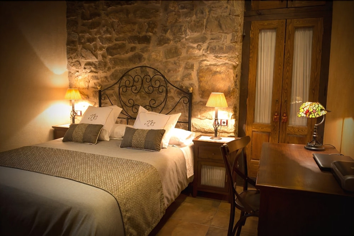 Imagen de la habitación del Hotel Rusticae La Casassa De Ribes. Foto 6