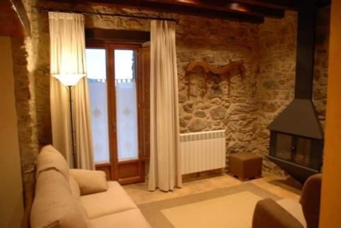 Imagen de la habitación del Hotel Rusticae La Casassa De Ribes. Foto 7