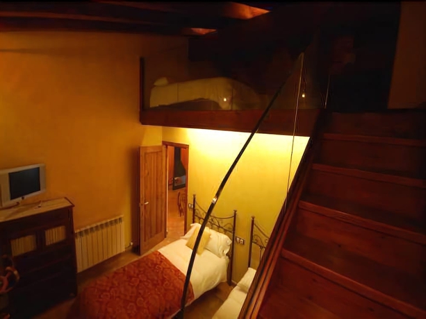 Imagen de la habitación del Hotel Rusticae La Casassa De Ribes. Foto 9