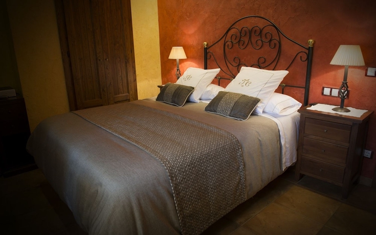 Imagen de la habitación del Hotel Rusticae La Casassa De Ribes. Foto 10