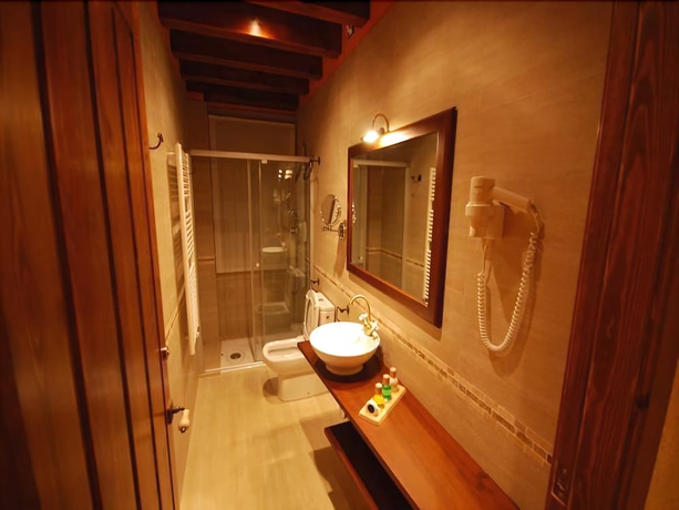 Imagen de la habitación del Hotel Rusticae La Casassa De Ribes. Foto 16