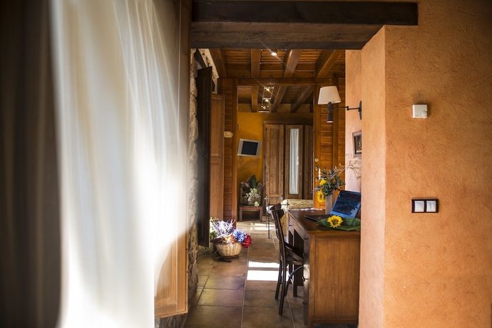 Imagen de la habitación del Hotel Rusticae La Casassa De Ribes. Foto 18