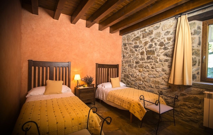 Imagen de la habitación del Hotel Rusticae La Casassa De Ribes. Foto 19