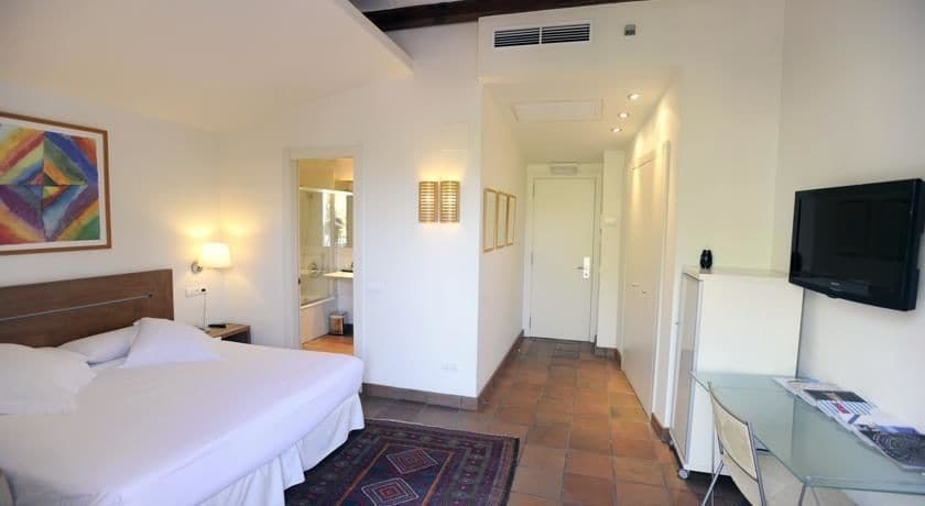 Imagen de la habitación del Hotel Rusticae Tancat De Codorniù. Foto 17