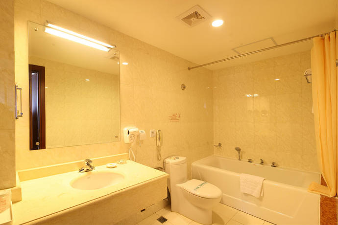 Imagen de la habitación del Hotel Ruyi Business. Foto 7