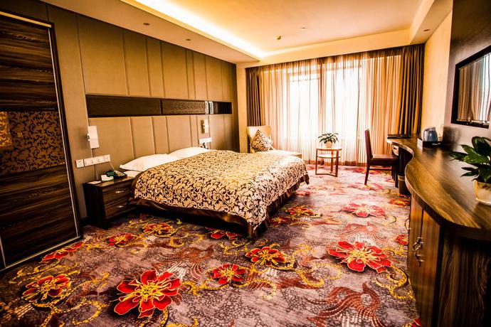 Imagen de la habitación del Hotel Ruyi Business. Foto 8